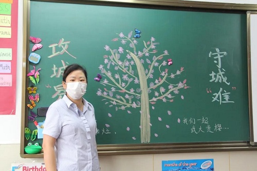 夏蟲啾啾，與子和鳴。童語幺幺，其樂盈盈/力邁中美學(xué)校四五年級(jí)學(xué)生返校剪影(圖6)
